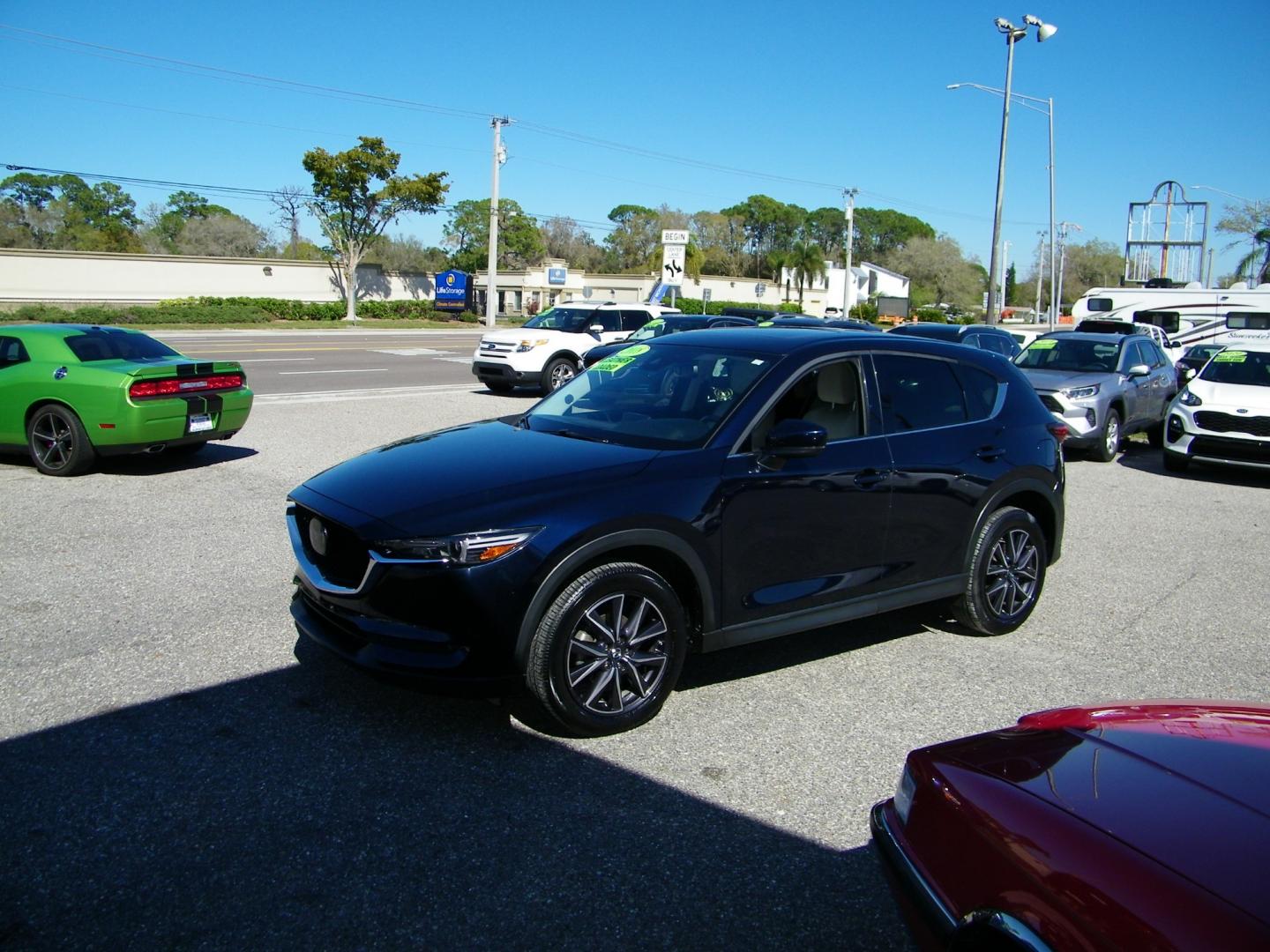 2018 Blue /Black Mazda CX-5 Grand Touring (JM3KFADM8J1) with an 2.5L L4 DOHC 16V engine, 6A transmission, located at 4000 Bee Ridge Road, Sarasota, FL, 34233, (941) 926-0300, 27.298664, -82.489151 - Photo#0